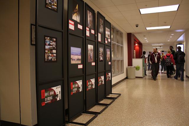 Display boards line the hallway between the JBK and the student success center to show off the winners for the study abroad photo contest. Photo by Frankie Sanchez.