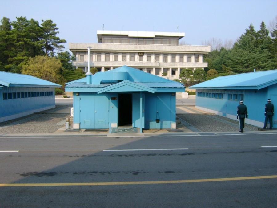 A South Korean soldier, foreground, stares at a North Korean soldier across the border at the Joint Security Area near Panmunjom, which is inside the Demilitarized Zone. Courtesy of Dr. Butler Cain.