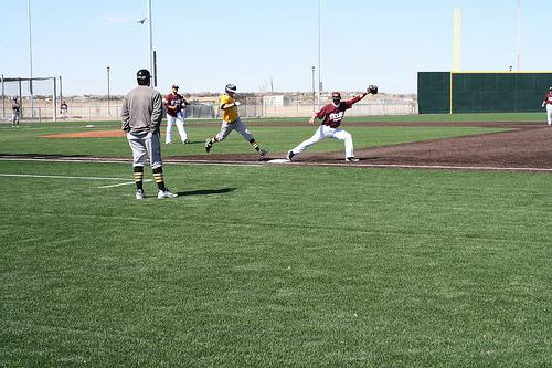 The Buffs get an out at first base. Photo by Kati Watson.