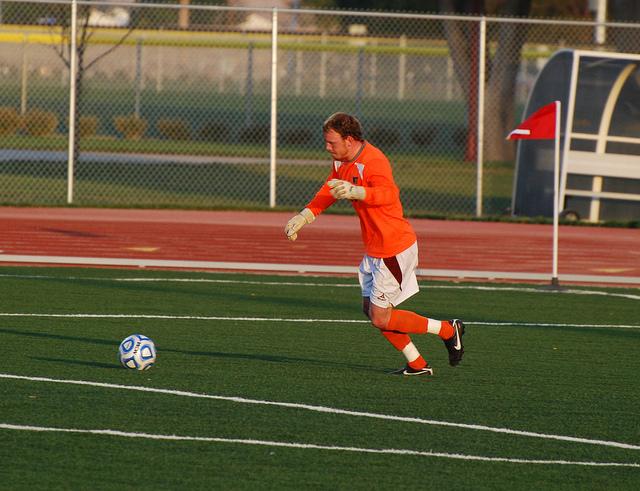 Goalkeeper Sebastian Furness clears the ball from the net. Photo by Melissa Bauer-Herzog.