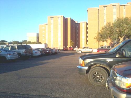 The parking space behind Jones and Cross Hall where the new dorm will be built. Photo by Maria Molina.