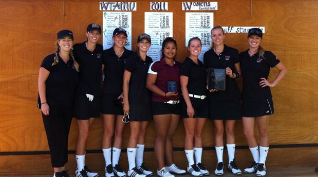 Lady Buffs hold up trophies from the tournament. Photo courtesy of Brent Seales.