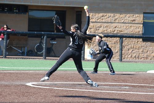 Marci Womack winds up for a pitch. Photo by Melissa Bauer-Herzog.