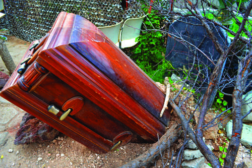 A coffin buried in the ground adds to the scary atmosphere. Photo by Alex Montoya.
