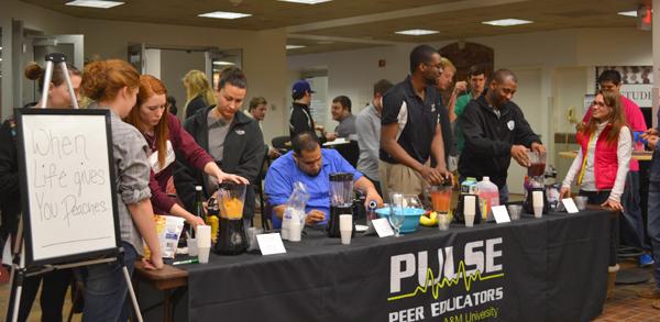 Students participate in the PULSE ‘When Life Gives You Peaches’ mocktail contest. Photo by Alex Montoya.