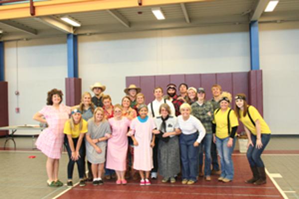 Helpers dress up for Halloween carnival.