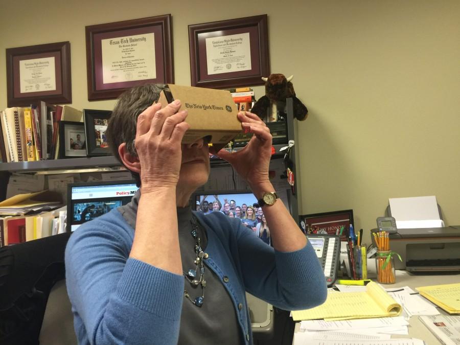 Department of Communication Head, Dr. Trudy Hanson, demonstrates how to use Google Cardboard.