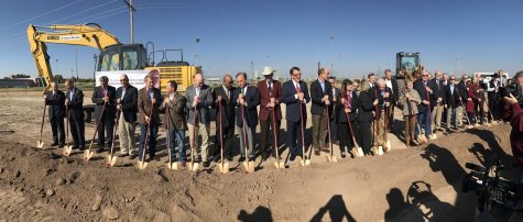 West Texas A&M University president, Dr. Walter Wendler, is flanked by numerous officials and dignitaries at the new Agricultural Sciences Complex