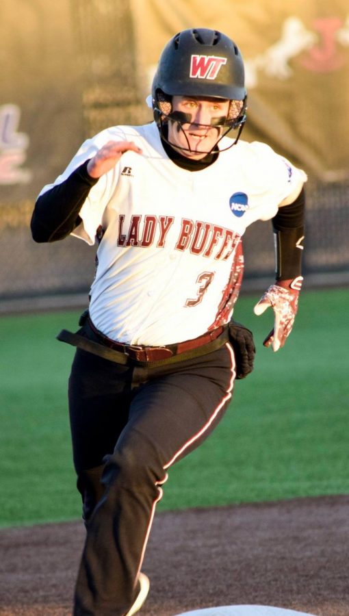 Ashley Hardin rounds second base during the game against Regis on Friday, Feb. 2 at Schaeffer Park.