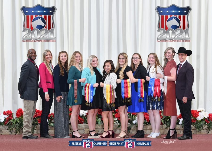 West Texas A&M University horse judging team members Sal Washington, from left, Kami Woodard, Quinn Dunham, Grace Wolfington, Sydni Nilles, Hannah McLochlin, Makenzie Knipe, Sierra Stammen, Mackenzie Berkland, Calli Montague pose following the Oct. 13 All-American Quarter Horse Congress competition with Dr. John Pipkin, Regents professor of agriculture and director of WT’s Equine Industry Program. Assistant coaches Maggie Murphy and Baily Summers are not pictured. Photo by WTAMU Communication and Marketing