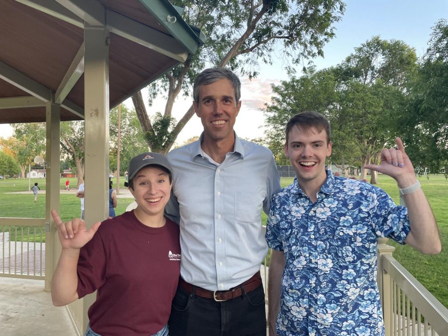 Madelyn Eatley and Marcus Rogers visit with Beto while throwing the Buff hand sign at an event in Lubbock for expanding voting rights in the summer of 2021.