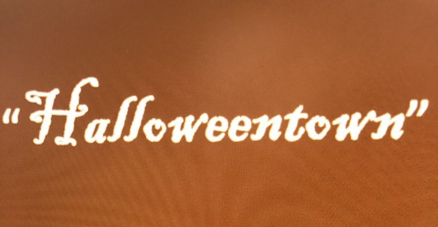 A graphic designed by Victoria Fatiregun of Halloweentown set within the background of colors representing the fall. (Canyon, TX/ Wednesday Oct. 19)