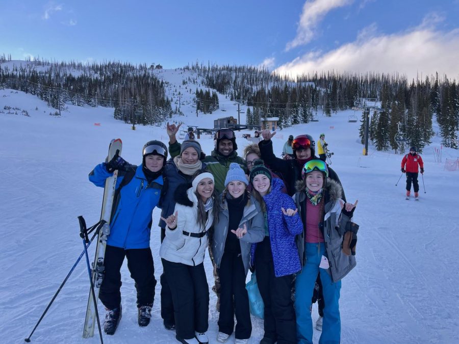 WT students and Brianna Jarrett, a mix of skiers and snowboarders, throw up the Buffs hand sign after an enjoyable trip at Wolf Creek Ski area, Pagosa Springs,CO.