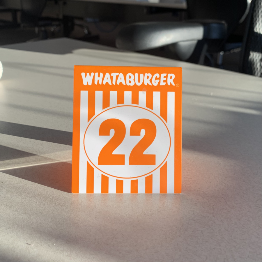 Whataburgers iconic table tents, number 22, sits in the Prairie Newsroom.