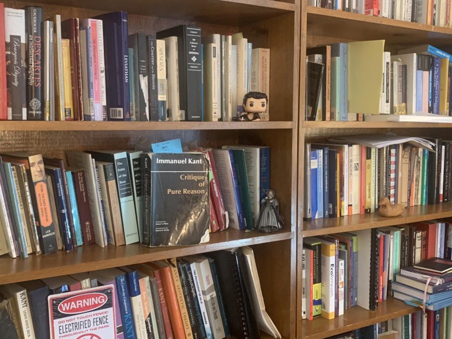Several books line the shelves of Assistant Professor of Philosophy, Dr. Laura Mueller. One such book that we talked about is the Critique of Pure Reason by Immanuel Kant. 