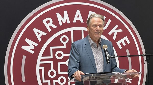  John Marmaduke, former Hastings CEO, speaks at the grand opening of the newly renamed Marmaduke Internet Innovation Center on the campus of West Texas A&M University.