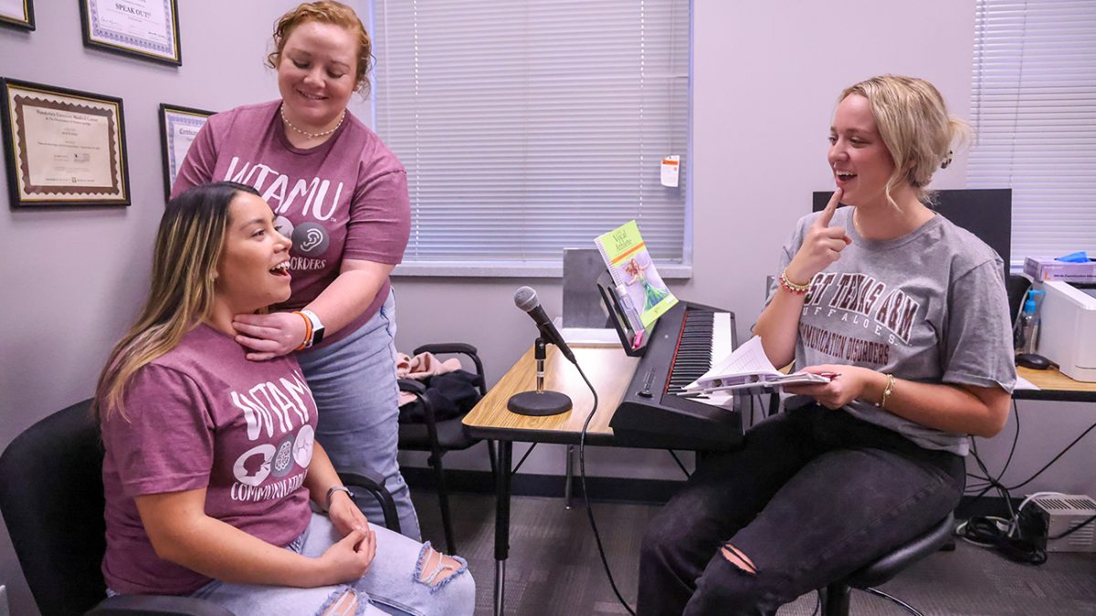 West Texas A&M University speech-language graduate students will host a vocal hygiene spa and prevention clinic Nov. 7, offering free screenings and therapy strategies for the community. Seen here practicing a screeening are, from left, Itzel Gaytan, Zoe Skorodin and Zoey Riley, all graduate students in WTs Department of Communication Disorders.