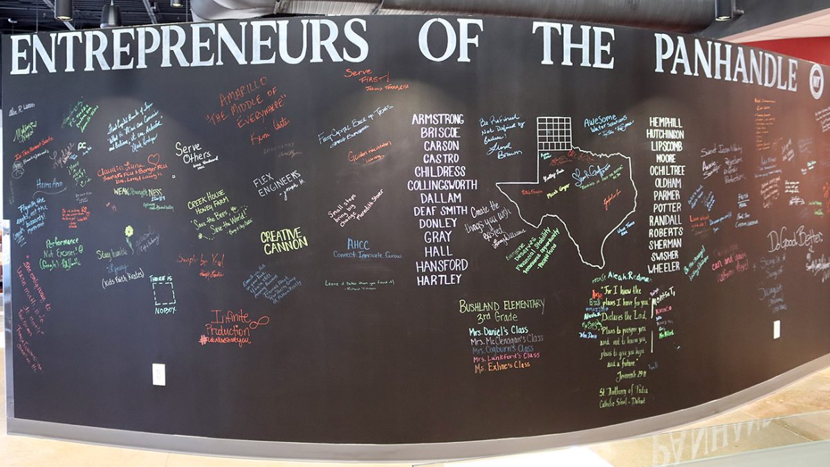 Business owners are encouraged to write inspirational messages for future entrepreneurs on the WT Enterprise Centers “Entrepreneurs of the Panhandle” wall.