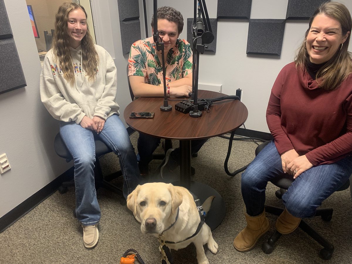 “I Am WT” hosts Myka Bailey and Thomas Rodriguez interview Dr. Sara-Louise Newcomer, the Long Professor of Companion Animal Studies, and her trained therapy dog Willow Kate on the latest episode of the podcast.