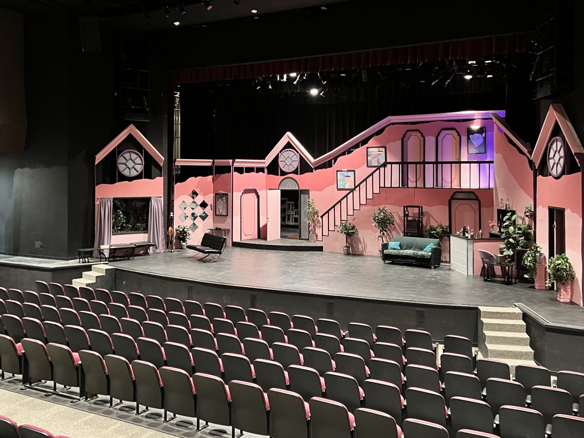 The set of Rumors, which will run at the Branding Iron Theatre through April 14.