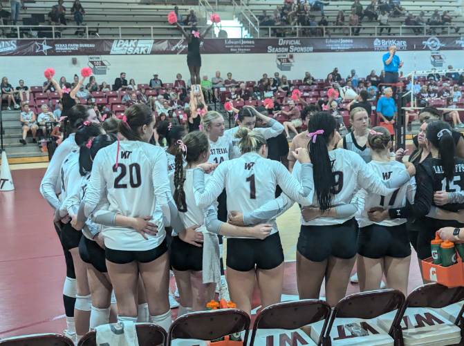 WT's Lady Buff's volleyball team huddles to discuss strategy during their game against Lubbock Christian University on Oct. 5.