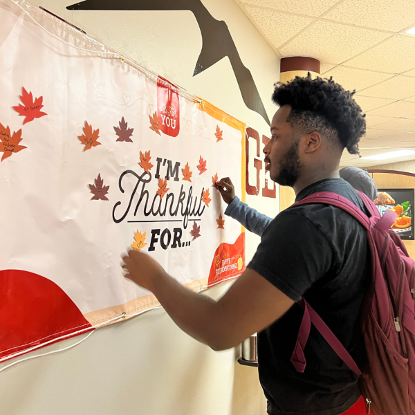 Activities students can do at this event include making friendship bracelets and writing what they are thankful for on this banner.