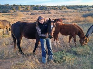 Gates with her horse, Gracie.